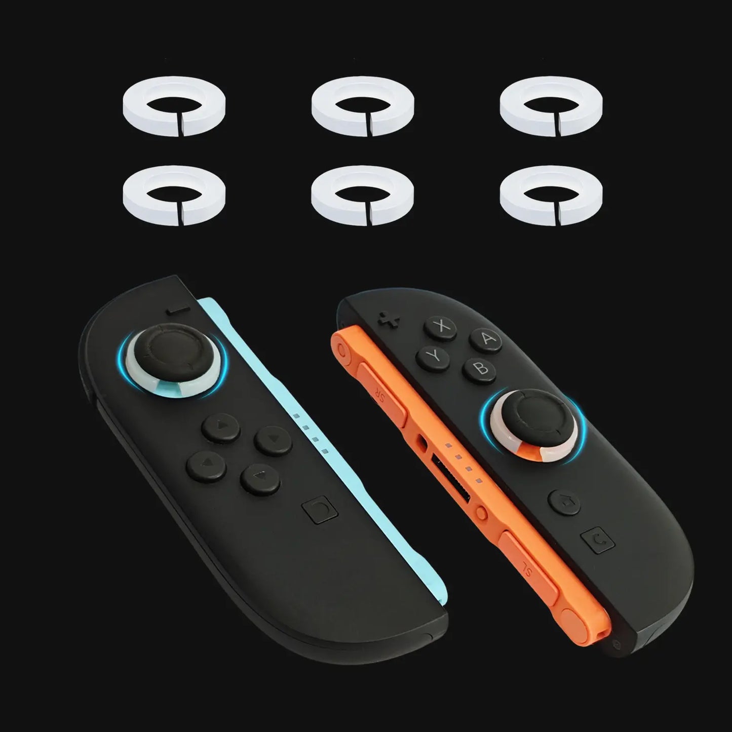 Switch 2 Joy-cons clamped with 2 silicone stabilizers and 6 pieces of the white rings above them